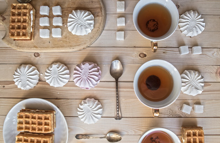 Tea with waffles and marshmallowsの写真素材