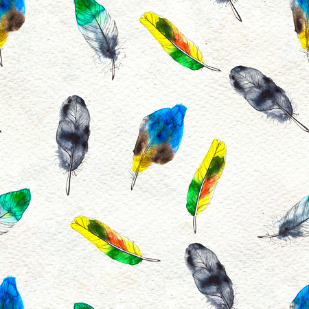 Watercolor seamless pattern. Hand painted texture with various multicolor bird feathers.の写真素材