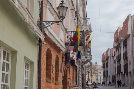 Vilnius, Lithuania - April 11, 2019: Tourists and local residents walking on the streets of medieval Old Town of Vilnius.のeditorial素材