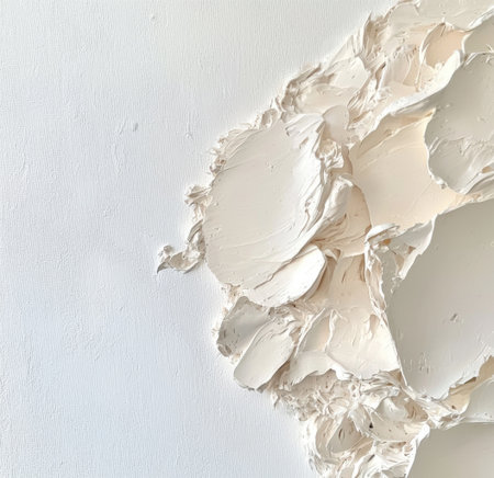 Thick impasto paint creating textured white shapes on canvas forms an abstract art piece, highlighting the interplay of texture and form in a captivating visual experienceの素材