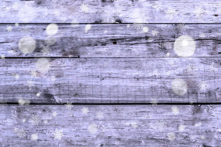 Clear wood tables with snowflakesの写真素材