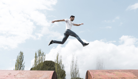 Man jump on another trainの写真素材