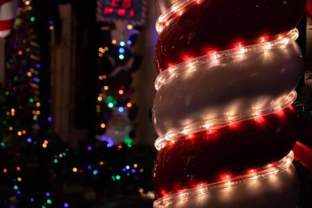Christmas outside street decoration with lights, deer, presents, elves. Selective focus.の写真素材