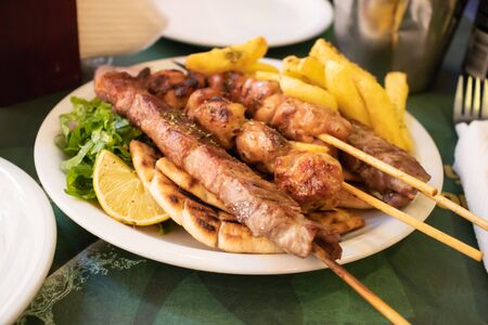 Traditional souvlaki greek dish with chicken and meatの写真素材
