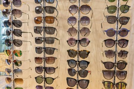 Sunglasses and reading glasses sale in athens on a local marketの写真素材