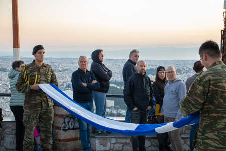 Athens, Greece - November 30 2019: Two soldiers folding greek flag in Athensのeditorial素材
