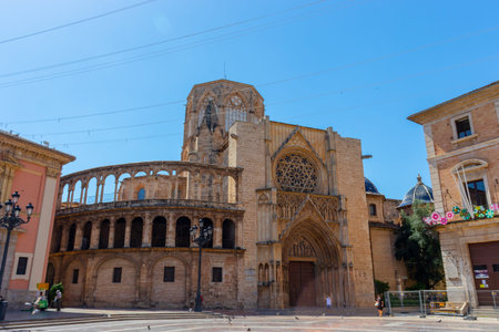 Square with a fountain in front of Gothic Valencia Cathedral