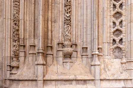 VALENCIA, SPAIN - JULY 15, 2020: Floral bas-relief of an ancient gothic cathedral in Valencia