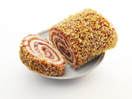 Roll with nuts, c a fruit stuffing, on a plate
