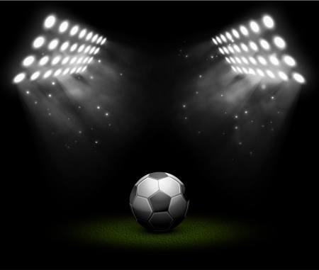 Soccer ball in light of searchlightsのイラスト素材