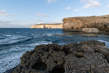 Seascape rocks and water in Gozo Maltaの写真素材