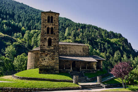 majestic view of the Church of Sant Joan de Caselles in the Andorran Pyreneesの写真素材