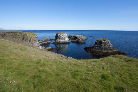Beautiful coastline at Gatklettur in Icelandの写真素材