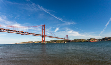 De abril bridge in lisbon portugaの写真素材