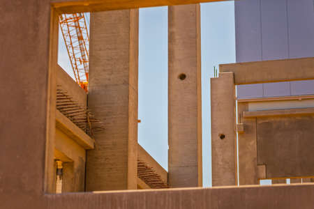 Construction site with precast concrete columns, beams and wallsの写真素材