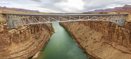 Panoramic picture of Navajo bridge and colorado river at daytime