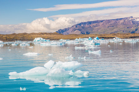 PanorPanoramic pictures over Joekularson glacier lagoon with frifting iceberg in summer