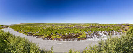 Panoramic picture of Hraunfossar waterfall on Icelandの写真素材