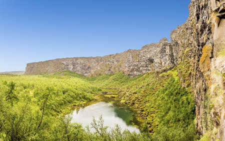 View from inner Asbyrgi canyon towards canyon exit on Iceland in summerの写真素材
