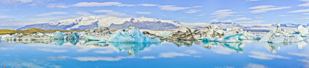PanorPanoramic pictures over Joekularson glacier lagoon with frifting iceberg in summer