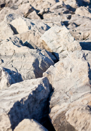 Recording of a rockbreaker made of stones on Lake Erie with high contrasts between sun and shadow