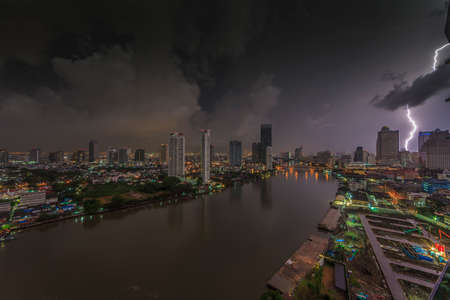Aerial view of lightning strike in nightly Bangkok skylineの写真素材