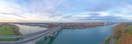 Aerial view of the Nibelungen Bridge in Worms with a view of the city gate during sunriseの写真素材