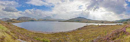 Panoramic picture over rough bay in Scottlandの写真素材