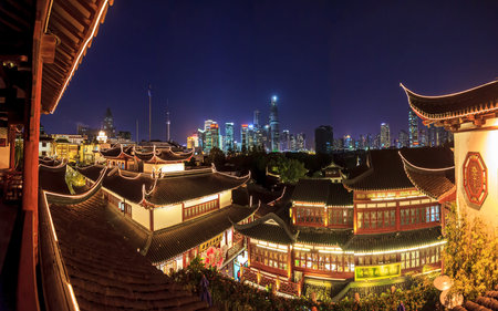Panoramic image of Shanghai Pudong district skyline from the historic city center at night with clear skyの写真素材