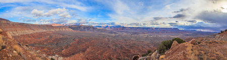 Panoramic view from the Arizona desert in winter from an elevated perspective with impressive cloud formations photographed during the day in the USA in January 2013の写真素材