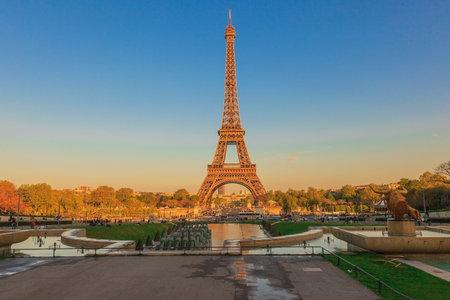 View of Paris Eiffel Tower in evening light in summer