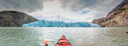 Panoramic image taken from a canoe over the edge of the Gray Glacier in Torres del Paine National Park in Patagonia in summerの写真素材