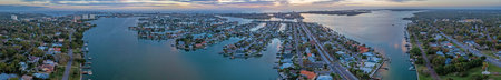 Drone panorama over South Causeway Isles and Treasure Island in St. Petersburg in Florida during...