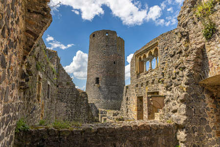 Image from the historic German castle ruins Muenzenberg in Hesse during the day with slightly cloudy skyの写真素材