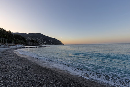 View over the pebble beach of Moneglia on the Ligurian coastの写真素材