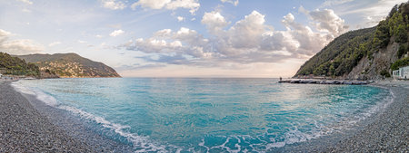 View over the pebble beach of Moneglia on the Ligurian coastの写真素材
