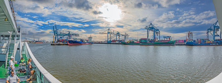 Panoramic picture from port Rotterdam with transport ships during daytime