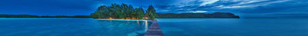 Panoramic view over Carp Island pier in Palau during sunsetの写真素材
