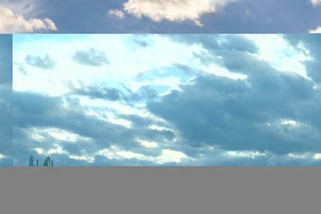 Image of dark clouds in the sky in daylightの写真素材