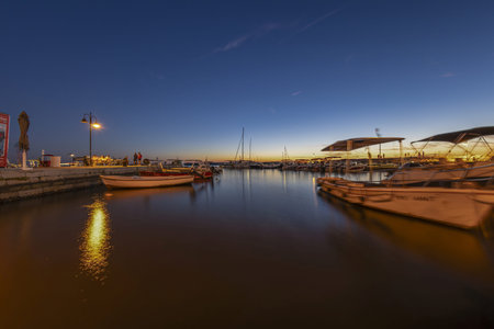 Picture over the harbor of Fazana in Istria in the evening during sunset in summer
