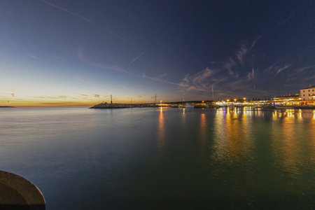 Sunset in the harbor of the Croatian coastal village of Fazana in summerの写真素材