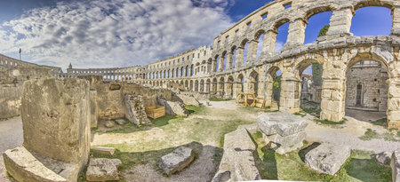 View inside the Roman amphitheater in the Croatian city of Pula without people during the dayの写真素材