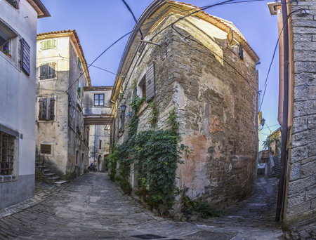 Picture from the historic town of Groznjan in Istria with idyllic cobbled streets and buildings made of natural stone during the dayの写真素材