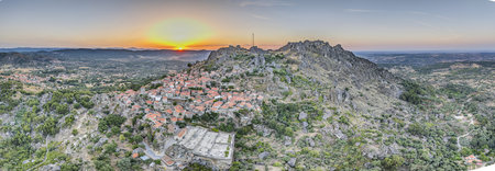 Drone panorama of historic city and fortification Monsanto in Portugal in the morning during summer sunriseの写真素材