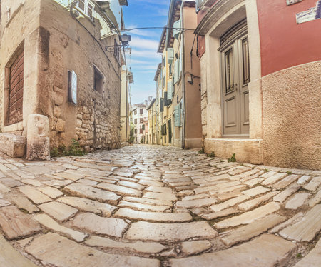 Picture from the historic town of Groznjan in Istria with idyllic cobbled streets and buildings made of natural stone during the dayの写真素材