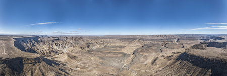 Panoramic drone picture of the Fish River Canyon in Namibia taken from the upper edge of the south side in summerの写真素材
