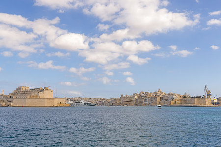 Panoramic view over the marina to the castle of the Maltese capital Valetta during the dayの写真素材