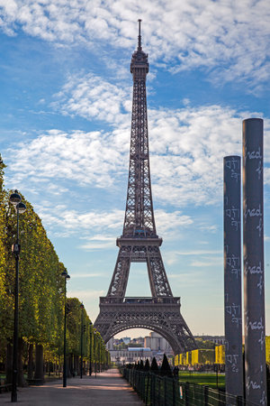 Eiffel Tower in Paris during a bright sunny day with blue sky in summerの写真素材