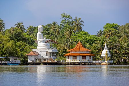 Buddha statue at Kande Viharaya Temple near Bentota River in Sri Lanka, no people visible, during daytimeの写真素材