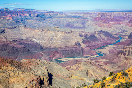 Vast view of the Grand Canyon with the winding Colorado River below.の写真素材